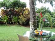A102 - Landscaped area from front door across covered lanai
