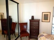 A107 - Second Bedroom - Dresser and Sliding Glass Wall Storage